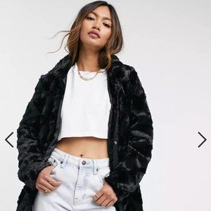 Vero Moda curly faux fur jacket in black